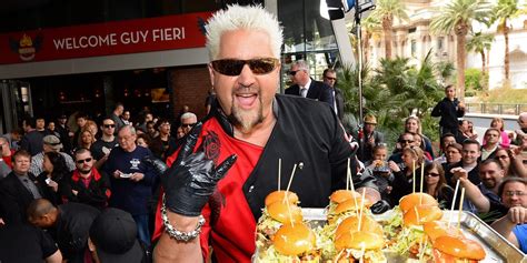 Guy Fieri Reveals the Story Behind the Famous Flame Shirt.